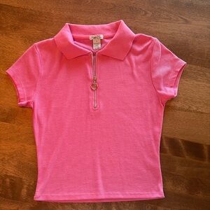 Rue21 Women’s short sleeve 1/2 zip top. Cute, washes up nice, lightweight.